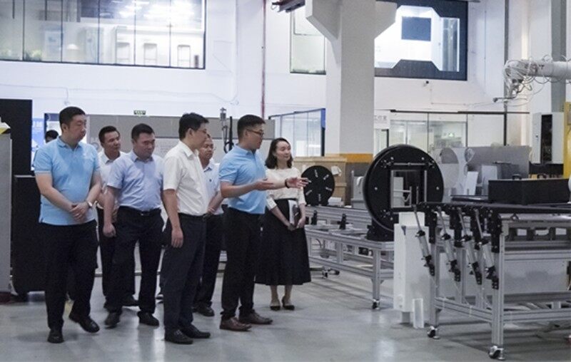 Director Wang of Liangjiang New District Management Committee and His Delegation Visited Forplus Waterjet for Research and Guidance